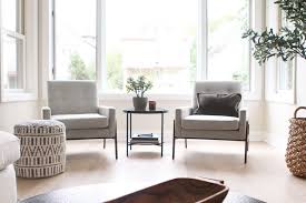 If you have a solid color sofa or sectional, find a patterned accent chair that incorporates the solid color of your other furniture. Living Room Seating Adding Cozy Chairs The Diy Playbook