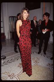The actress shared a snapshot of herself watching tv in the shiny, slinky gown she first wore back in 1999 to the cfda awards. Vogue Vogue