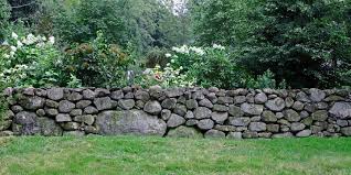 Building a freestanding stone garden wall will add timeless beauty to your landscape. The Art Of The Dry Stack Stone Wall Insteading