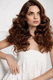 These are the best products, haircuts and styling tips for wavy, thick & unruly men's hair types, so you can get your disobedient mane under control. Hair Style Beautiful Woman With Healthy Long Wavy Curly Hair Stock Photo Picture And Royalty Free Image Image 70690032