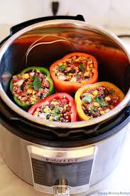 Instant Pot Vegetarian Stuffed Peppers With Quinoa And Black Beans Instant Pot In 2021 Vegetarian Instant Pot Instant Pot Recipes Vegetarian Vegan Instant Pot Recipes