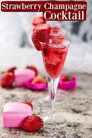 Celebrate christmas eve in style by serving bubbly dosed with a bit of sugar and a few dashes of bitters. Strawberry Champagne Cocktail Recipe Tammilee Tips