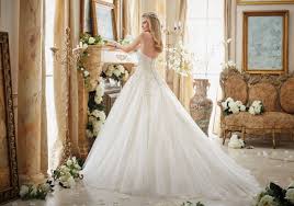 Romantic wedding dress from 1980s romantic lace bodice sweetheart illusion neckline long lace sleeves with ruffles back closure buttons and zipper full tulle skirt decorated with lace it is fully lined with a satin polyester made in italy, handmade creation colour: Beaded Embroidery On Tulle Cinderella Ball Gown Morilee