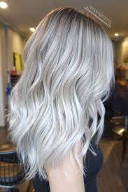 The New Platinum Blonde Is Here And It S The Only Hair Inspiration You Ll Need This Spring Silver Blonde Hair Blonde Hair Shades Icy Blonde Hair