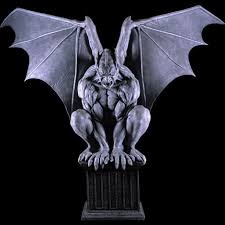 These figures were usually used as gutters on roofs to divert water away from buildings. 27 Evil Gargoyle Tattoo Designs
