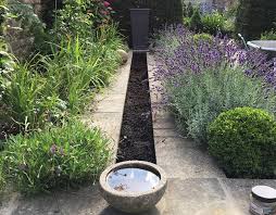 Install lighting in your garden. Garden Designer Bath Tips For Low Maintenance Gardens