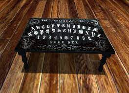 If you're not one of those people and have ever wanted to conjure spirits over your morning coffee or summon a demon while enjoying some tacos, then these tables are for you. Second Life Marketplace Petite Mort Dark Wood Ouija Board Coffee Table Mesh