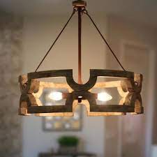 The first chandeliers were rustic constructions of wood beams with candles, and in those days, quality candles were expensive. Rustic Chandeliers Lighting The Home Depot