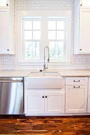 My aunt liz (also referred to as great liz to our kids) transferred to richmond a couple of years before but did not have a backsplash put in if her new home was built. White Subway Tile Backsplash White Subway Tiles From Counter To Ceiling Whitesubwaytilebac Farmhouse Sink Kitchen Kitchen Sink Design Interior Design Kitchen