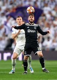 Lasse schone's corner found matthijs de ligt, whose header was scooped by courtois into the air. Toni Kroos Of Real Madrid Competes For The Ball With Lasse Schone Of Voetbal