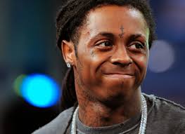 Lil Wayne pleads guilty to taking gold plated handgun