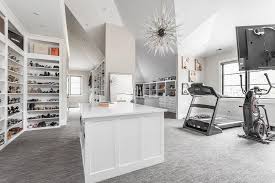 Don't let the closet become the only comfortable room in the house. Walk In Closet And Home Gym Combo Contemporary Closet