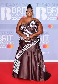 Lizzo Goes Quirky In Hershey S Chocolate Bar Dress At The 2020 Brit Awards In 2020 Brit Awards Celebrity Look Celebrity Style