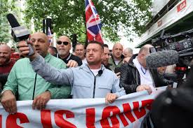 Tommy Robinson marchers lead anti-Muslim chant in London demo | The  Independent
