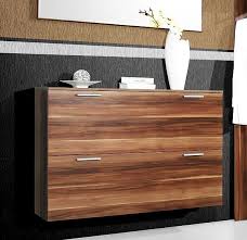 The shoe cabinet is complemented by the soft, curved edges for a sleek appearance. 25 Shoe Storage Cabinets Ideas Entryway Shoe Storage Closet Shoe Storage Wood Shoe Storage