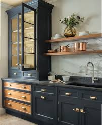 Dark Kitchen Cabinets Open Shelves Brass Hardware And A Marble Backsplash Create A Luxe Kitchen Look Kitchen Design Trends Kitchen Trends Home Decor Kitchen