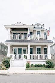 Get garden beds into shape by pruning growth, pulling weeds, and planting flowers. Beach House Curb Appeal Beach House Exterior Beach Cottage Style Beach House Decor