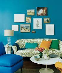 Decorating With Blue Domino Peacock Blue Living Room Blue Paint Living Room Teal Rooms