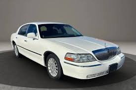 Image result for Light Ice Blue 2005 Town Car