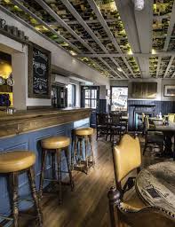 In The Midst Of A Vibrant Area Of Cambridge The Petersfield Is The Perfect Place For Afterwork Drinks With Colleagu Pub Interior Design Pub Interior Pub Decor