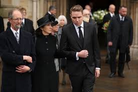 The funeral cortege arrives at great st marys funeral service of professor stephen hawking. Hawking Funeral Sees Hundreds Line Streets To Farewell Physicist