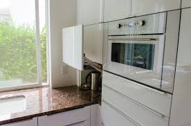 Imposing Vertical Kitchen Cabinet Door Lift With Ikea High Gloss White Kitchen Cabinet Also Sliding Glass Window Ikea Appliances White Modern Kitchen Ikea Hack