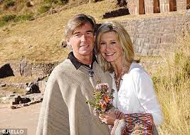 Pictured Olivia Newton John S Bizarre Peruvian Second Wedding To Amazon John Olivia Newton John Famous Couples Celebrity Couples