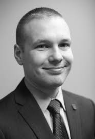 Mong the stately pines of Georgia Glorious to the view Stands our noble  Alma Mater Basking 'neath the blue. Alma Mater, the