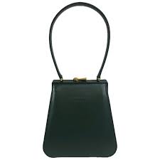 Its headquarters at scandicci, just outside florence, were designed with marazzi material throughout. Gianfranco Lotti Firenze Forest Green Leather Handbag For Sale At 1stdibs