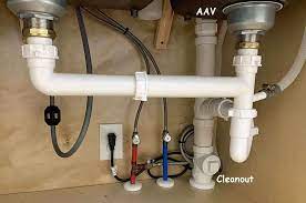 A kitchen sink drain ties two sinks together draining into one trap adapter outlet. 2 Air Admittance Valves On Double Sink Ipc 2009 Terry Love Plumbing Advice Remodel Diy Professional Forum