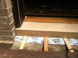 The door frame looks squared, so it may be that the installers crookedly cut the bottom or something shifted in the house. The Final Stretch Replacing The Door Sill Threshold A Home In College Hill