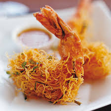 Marinati al punto giusto, fritti in una pasta croccante e tuffati in una salsa al mango! Gamberi In Gabbia Di Bacon Con Salsa All Arancia Fresco Pesce