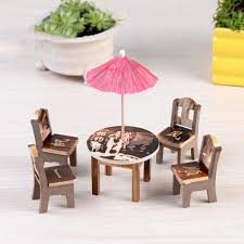 Wood patio tables give a rustic charm. New Hot Sale Table 4pcs Table Chair Miniature Craft Mini Dining Room Landscape Garden Decor Wooden Dollhouse Miniature Furniture Garden Statues Sculptures Aliexpress
