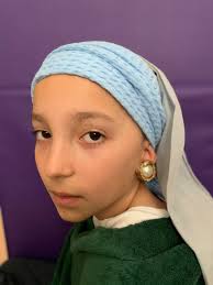 Ms. Hazel's Fourth Grade drama class had to choose one of seven portraits  and recreate the scene with what they could find at home for a costume,  props, and even a background.