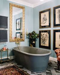 The shelving unit provides an abundance of storage for cotton balls and daily items as well as fun decorating pieces like jars filled with seashells. The Eclectic Bathroom Design Vs The Timeless One Bathrooms Eclectic Bathroom Design Eclectic Bathroom Timeless Bathroom