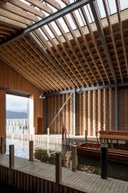 The Building Forms Are Somehow Familiar But Made Special By The Overhanging Canopies Which Extend The Insi Architecture Wood Architecture Architecture Design