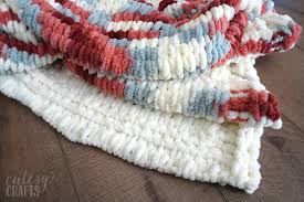 It was so exciting when lion brand offered to send me one of their newest yarns that happens to be a huge, gorgeous yarn perfect for a big blanket. How To Make A Loop Yarn Blanket Cutesy Crafts