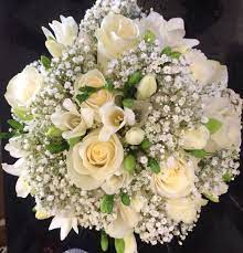 Freesia Roses And Gypsophila Cream And Green Bouquet Baby S Breath And Roses Wedding Flowe Elegant Wedding Flowers Peach Wedding Flowers Purple Wedding Flowers