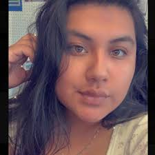 stiletto nail shape inspiration with blue sparkle?