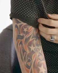 Machine gun kelly isn't afraid of a little ink. Meanings And Stories Behind Machine Gun Kelly S Tattoos Tattoo Me Now