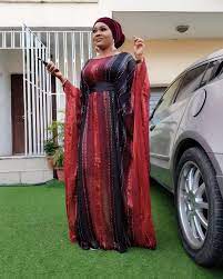Mercy runs an online clothing store and she has been modeling her wears on her own. Mercy Aigbe Rocking Colorful Abaya Styles For The Bosslady Outing African Maxi Dresses African Fashion African Fashion Dresses