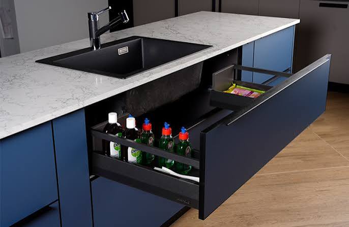 Modern under-sink kitchen cabinet with organised storage in Mauritius