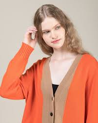 They come in pretty much any color of the rainbow, but you. Women S Color Block Orange Black And Beige Cardigan By Jucca Styloose