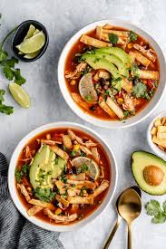 Combine chicken broth, water, diced tomatoes, taco seasoning, cumin, chili powder, garlic, cabbage and chicken in a crock pot. Crockpot Chicken Tortilla Soup Kim S Cravings