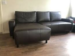 The piece is made from a sturdy wooden frame, comes with light gray fabric upholstery, and offers plush cushions and pillows for extra comfort. Ikea Sleeper Pull Out Couch With Storage Ebay