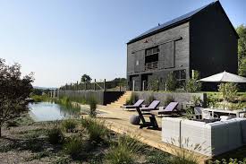 At litehouse you'll also find quality hot tubs, grills, patio furniture, gazebos, billiards, massage chairs, and saunas too. An Underground Garden Filters Water In This Natural Swimming Pool