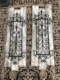Old Pallet Wood A Little Chalk Paint And Some Wrought Iron Decorations Are What I Used To Make This Rust Outdoor Wall Art Metal Tree Wall Art Rustic Wall Art