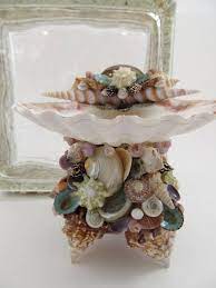 The florida fighting conch, strombus alatus, is another favorite among collectors and one of the more common finds along the western atlantic and gulf of dog conch or yellow conch, laevistrombus canarium canarium, better known as strombuscanarium, is from the family strombidae, the true conchs. Shell Pedestal Dish With Beach Collected Florida Fighting Fighting Conch Shell Crafts Ocean Theme Crafts