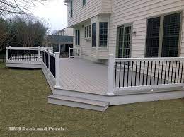 Vinyl Patio Deck With Wide Steps Using Azek Pvc Decking Slat Grey Flooring Deck Steps Outdoor Stair Railing Decks And Porches