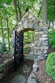 Its called the tappan zee bridge. A Beautiful Stone Arch Greets You On The Path To Your Private Tennis Court Ah The Good Life Garden Gates Dry Stone Wall Landscape Design